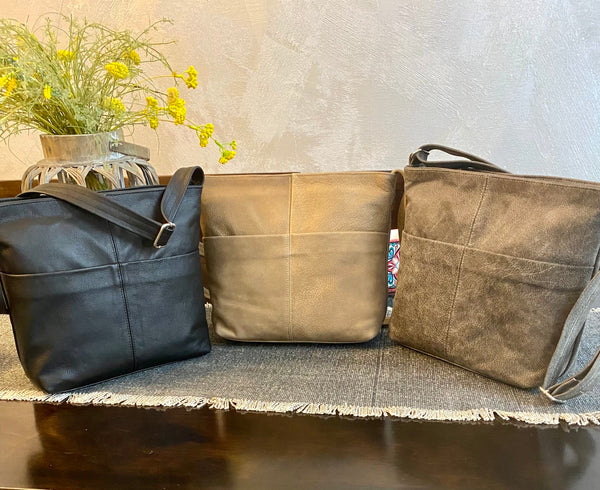 A messenger bag . Tote bag. - Avi Algrisi