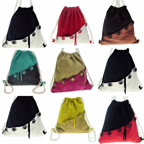 Leather floral backpack with  zipped outer pocket. - Avi Algrisi